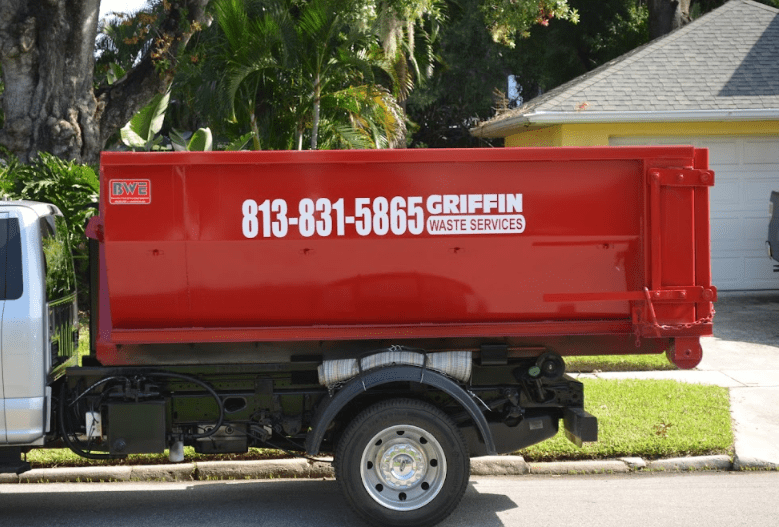 Truck with a dumpster in Hillsborough County, FL.