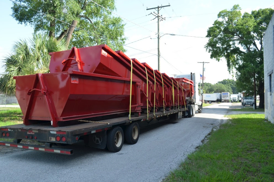 Truck with dumpsters in Seminole Heights, FL.