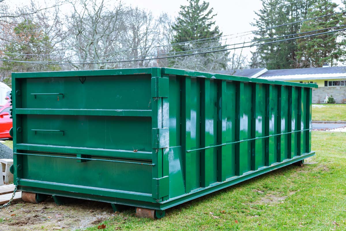 Truck with a 10 Yard dumpster near me.